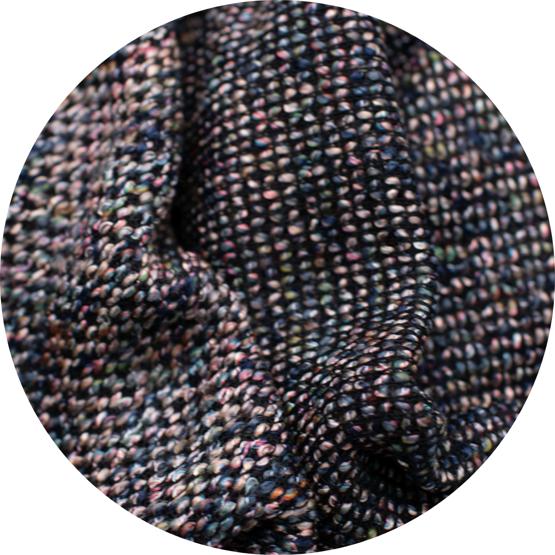 close up image of multicolor loose weave fabric