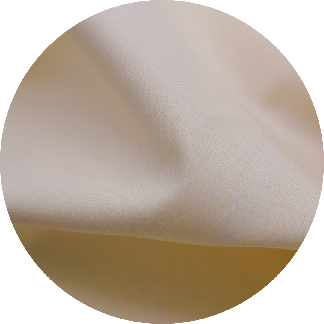 close up image of cream woven fabric